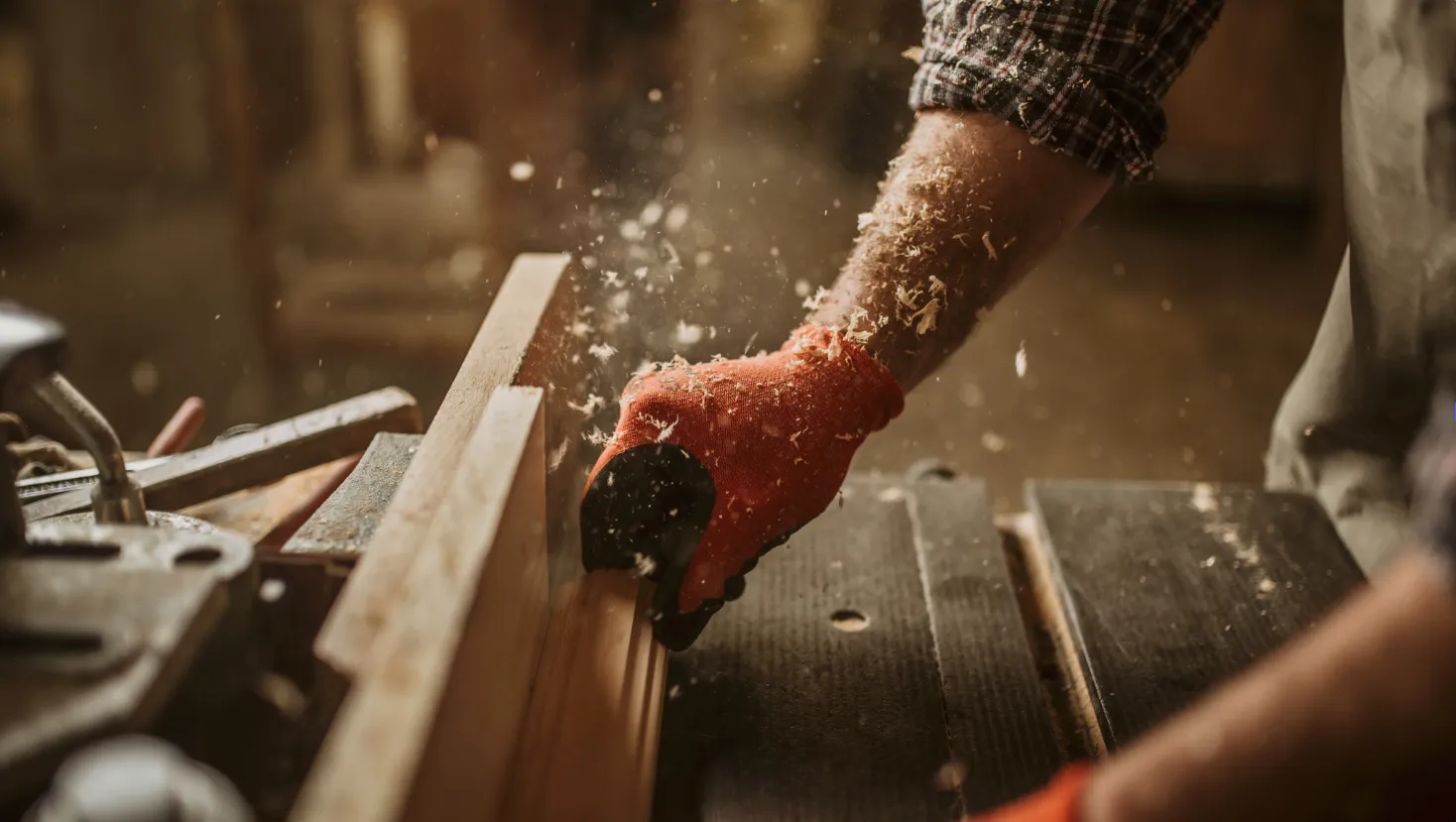 carpender working on a wood furniture.